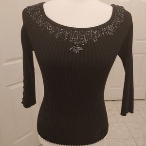 Black top with sequins accenting